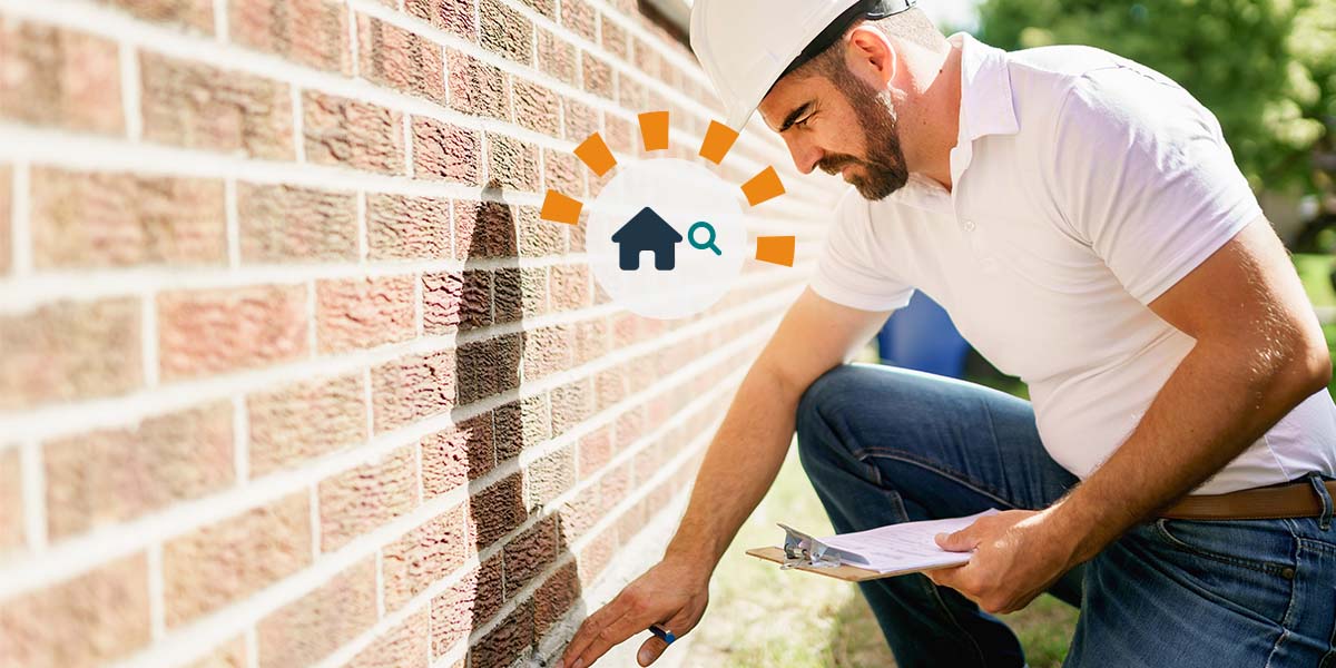 A home inspector examining a home before it is sold. 